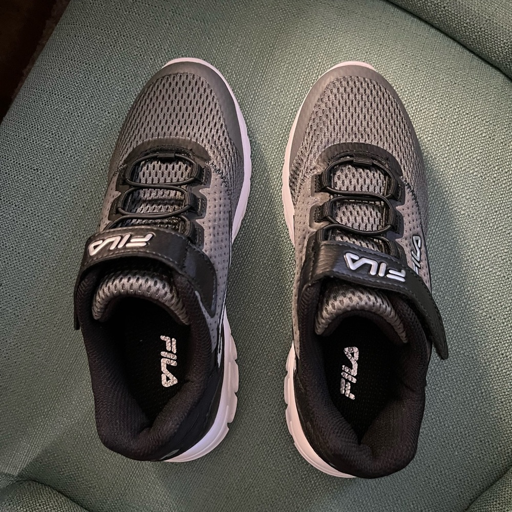Boys size 4 shoes.  New
